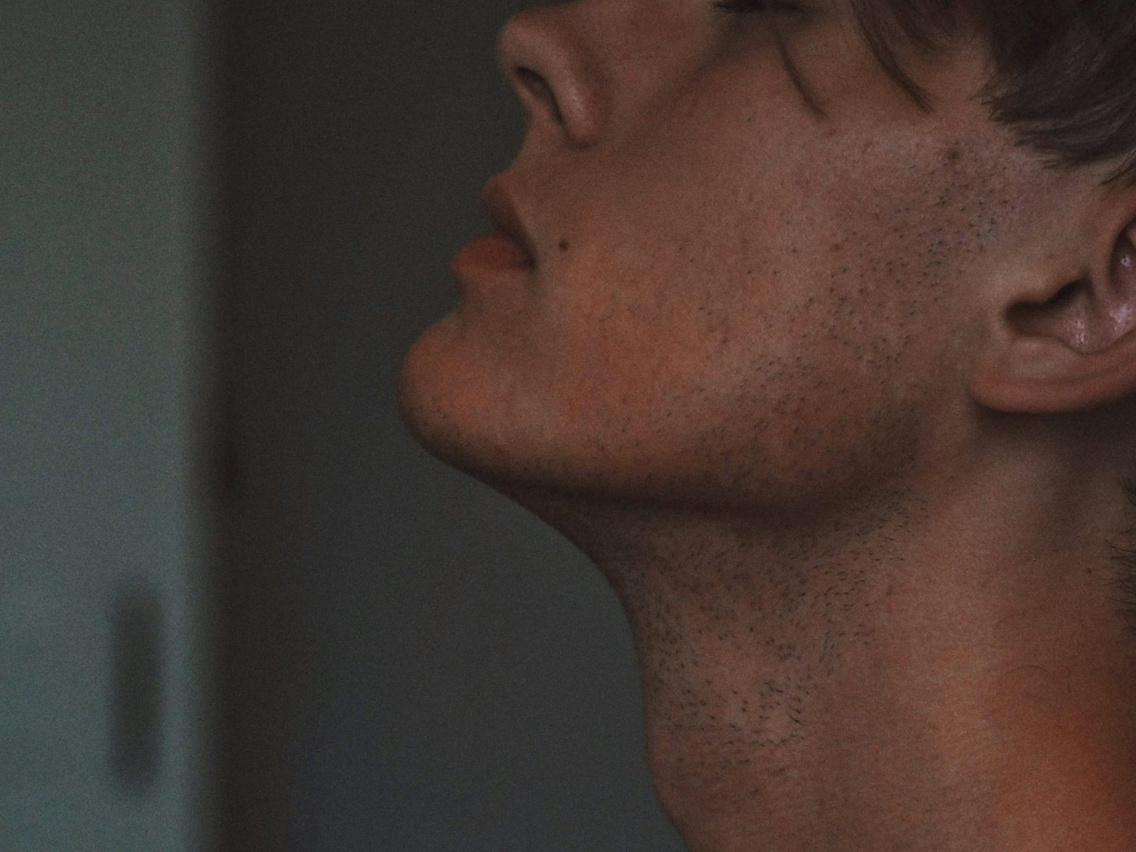 Hands at rest on the chest, mid-breath